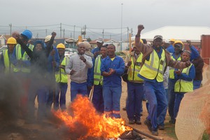 Photo of workers protesting