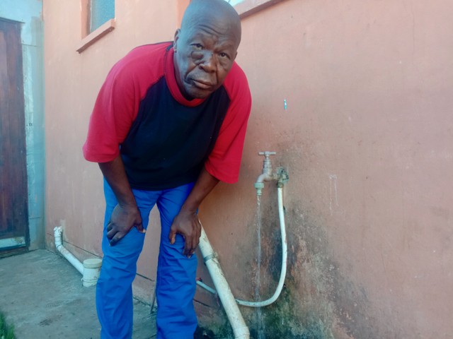 “I’m not the government!” says Patrick Yayi, of Chris Hani in KwaNobuhle. His house is one of only four with running water in the area.