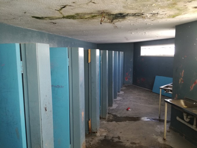 Photo of dilapidated school bathroom
