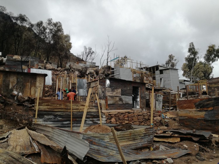 Photo of homes being rebuilt in Imizamo Yethu