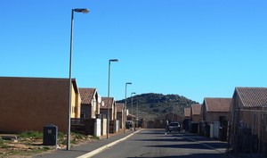 Photo of a street with houses
