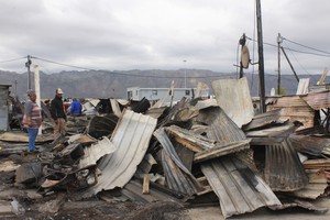 Photo of burned shacks