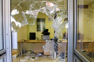 Photo of a smashed shop window