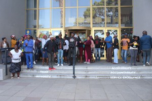 Photo of residents outside the municipal offices