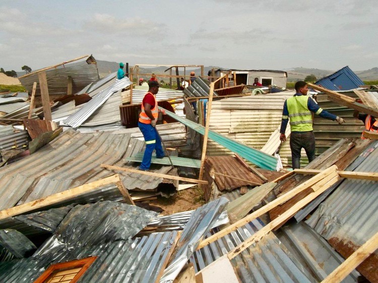 Photo of demolished shacks