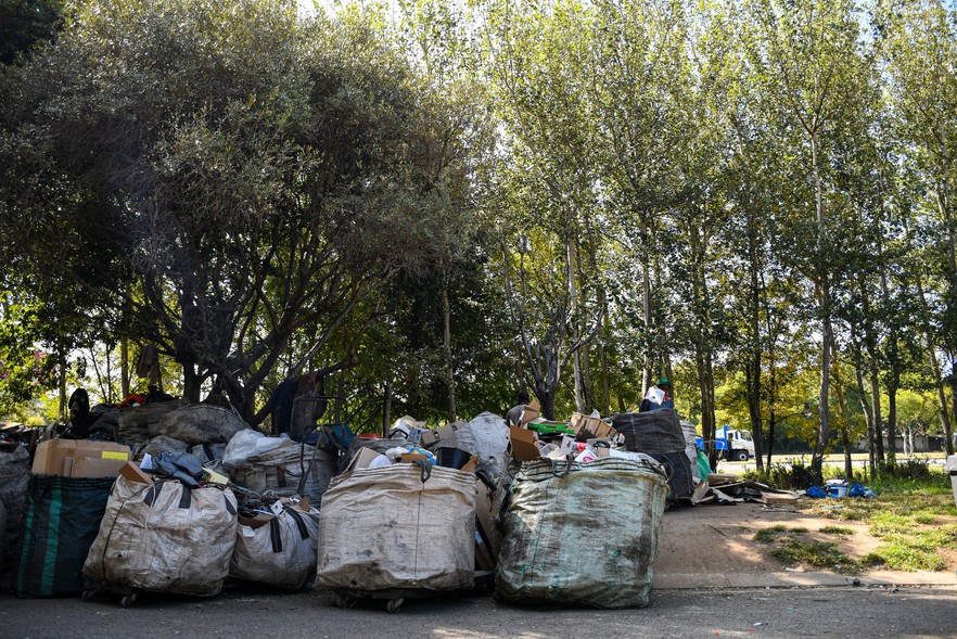 The camp where Refuoe Mokuoane lives often serves as a collection point for other waste pickers who live there. They have to sleep with their trolleys because, as Mokuoane says, what’s in them is the equivalent of money. Photo: Julia Evans