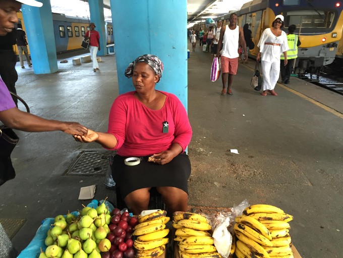 Picture of food trader at station