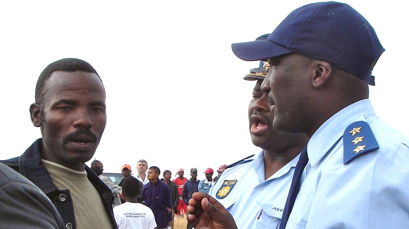 Photo of Sikhosiphi Bazooka Rhadebe and police
