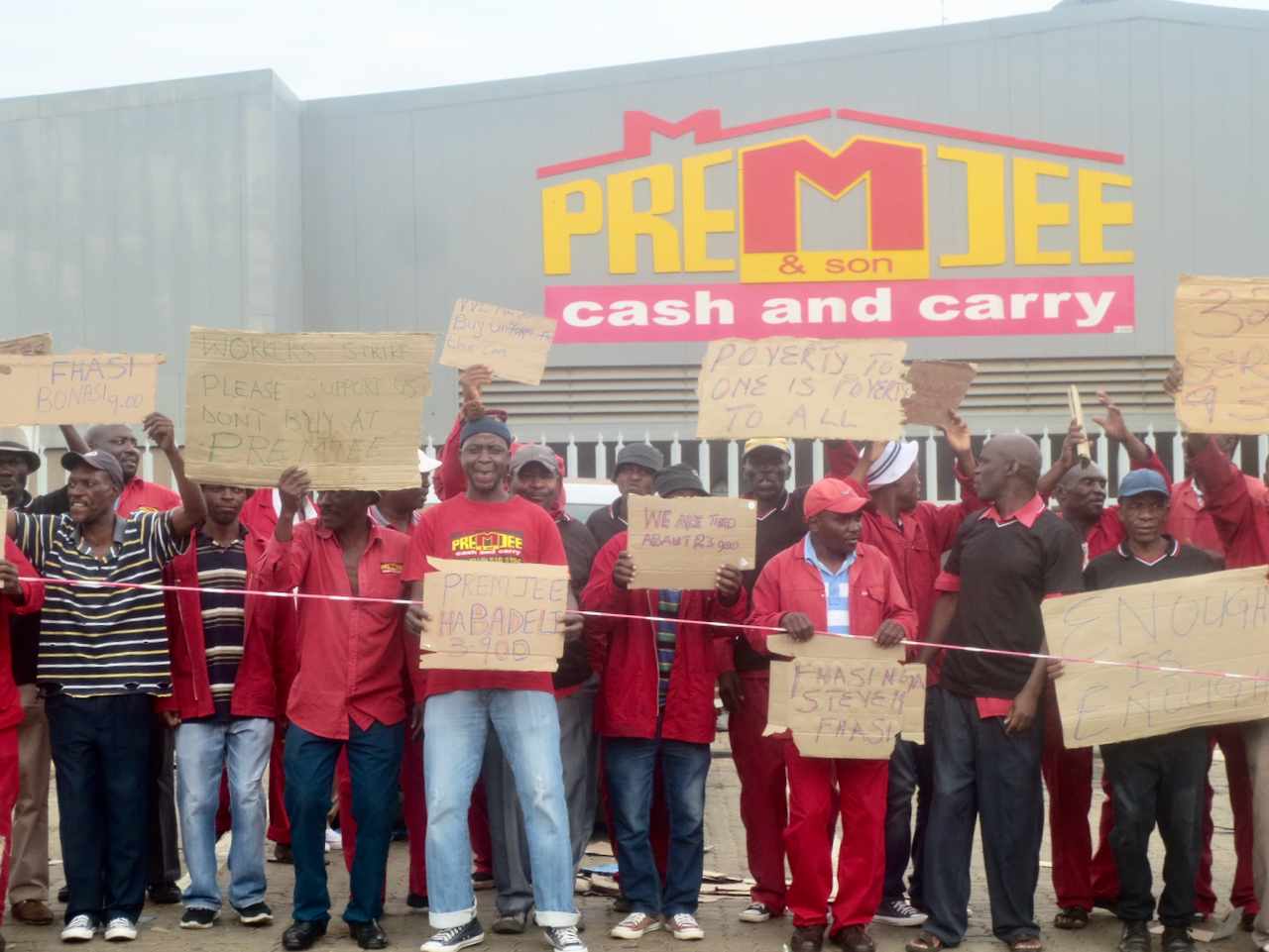 Premjee Unions at odds with each other over supermarket’s wage increase | GroundUp
