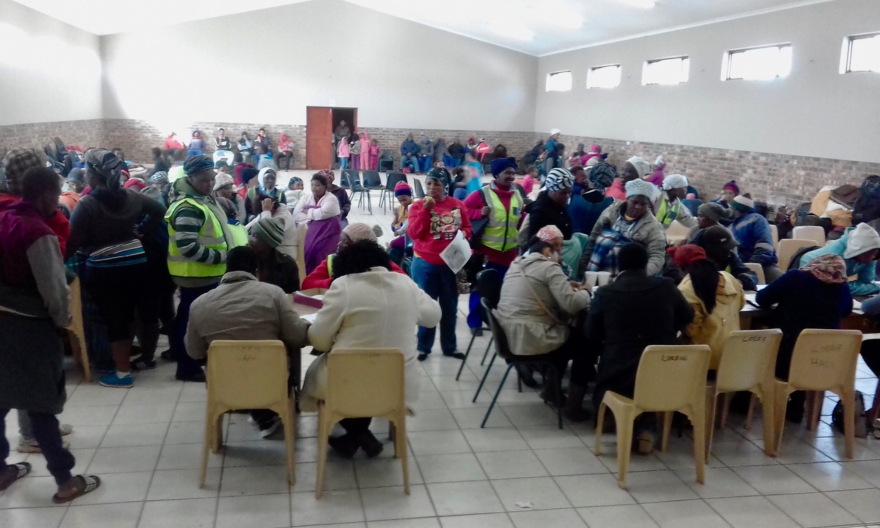 Photo of people gathered in a hall