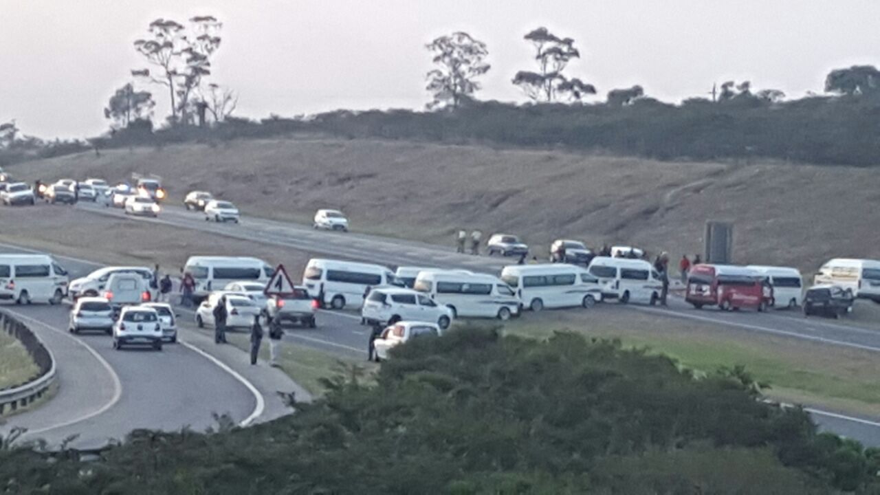 Photo of taxis blocking road