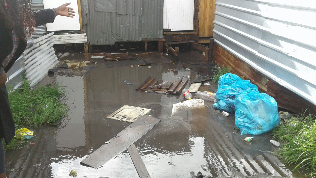 Photo of flooded shacks